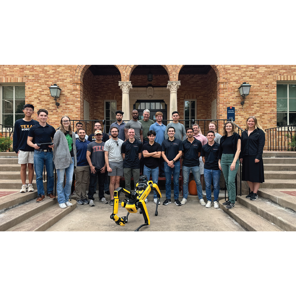 photo of the robotics group standing outside